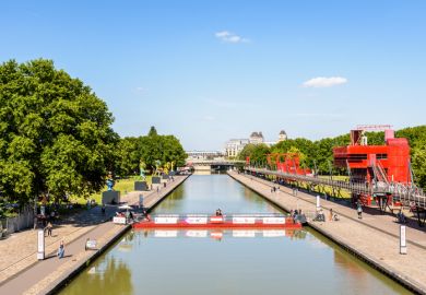 canal de l'Ourcq splitting the parc de la Villette in Paris, France canal de l'Ourcq splitting the parc de la Villette in Paris, France