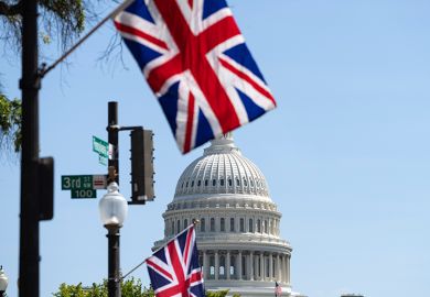 Union Jack flags flying near the US Capitol, illustrating that a record number of US students have applied to study undergraduate degrees in the UK