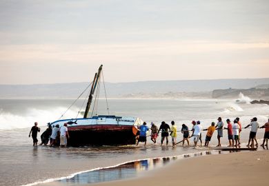 Capsized boat on beach