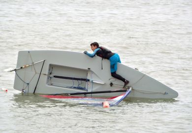 Capsized Sailing Dinghy Capsized Sailing Dinghy