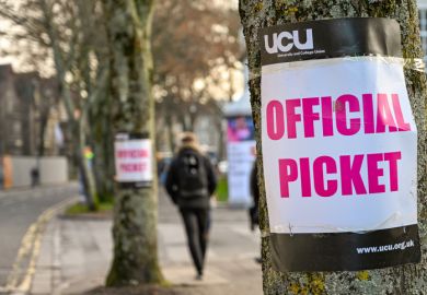Cardiff, Wales - November 2019 Sign attached to a tree near an official picket line outside Cardiff University. It marks industrial action by members of the Universities and College Union.