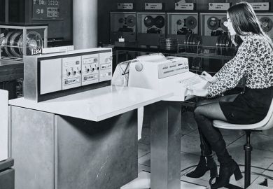 Cathy Gillespie working on IBM 360