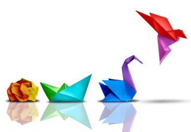 A ball of paper turns into an origami bird, illustrating successful change