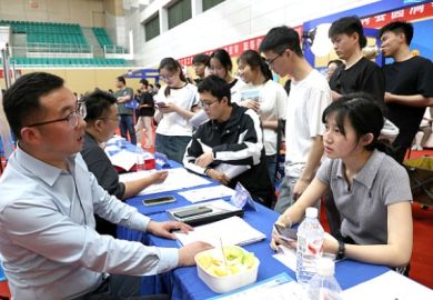 Students queue up at a job fair in China
