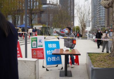 City Nantong in Jiangsu province in China, March 31 2022 government doing mass Covid-19 testing for Omicron. People line up for the registration and test
