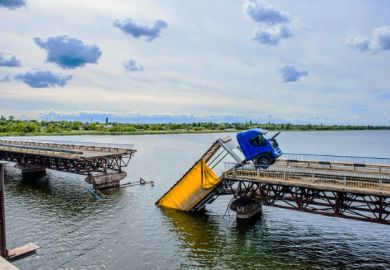 A collapsed bridge, representing failed grand challenges