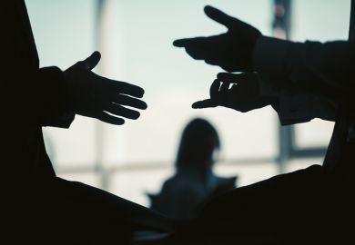 Two people in silhouette have a conversation Two people in silhouette have a conversation