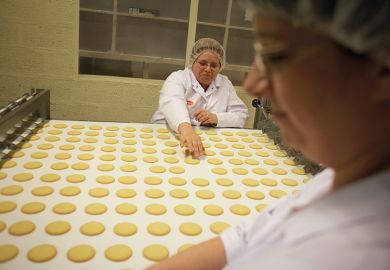 Bakers with biscuits