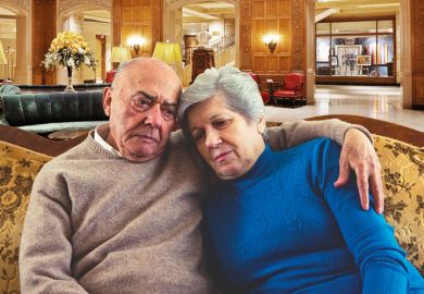 Couple in lobby of Fairmont Chateau Laurier Hotel, Ontario, Canada