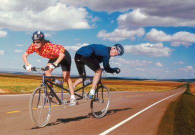 Couple struggling in opposite directions