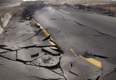 Cracked road damaged by earthquake