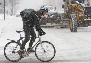 cyclist-in-snowstorm cyclist-in-snowstorm