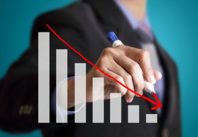 Man drawing decline on a graph