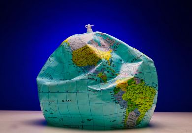 A deflated globe, illustrating that a rule requiring Australia’s universities to conduct “world standard” research in at least half of the fields they teach has been discarded before it was ever properly put into practice.