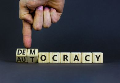 The word "democracy" turns into "autocracy"