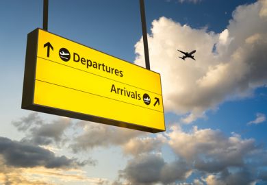 A plane flying over a departures and arrivals sign, symbolising internationalisation