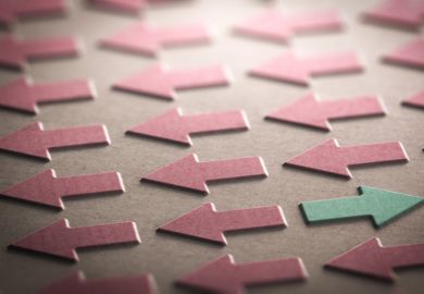 One arrow pointing away from all the other arrows One arrow pointing away from all the other arrows