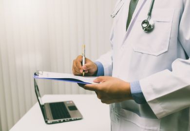 Doctor with clipboard