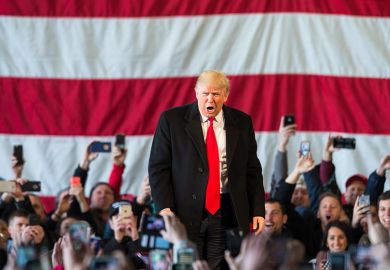Donald Trump speaks in front of a crowd