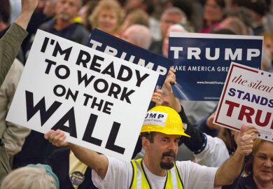Donald Trump supporters holding placards Donald Trump supporters holding placards