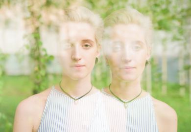 Double exposure of woman's face