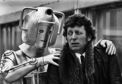 Dr Who (Tom Baker) looks concerned as a cyberman grabs his shoulders. To illustrate that most academics strongly opposed to using AI in REF 2029.