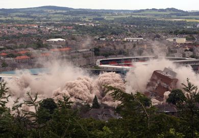 A general view of the Butterburn and Bucklemaker multi storey flats in the Hilltown area of Dundee, being razed to the ground during demolition. Illustrating that cuts at the University of Dundee will take a ‘wrecking ball’ to research and local economy