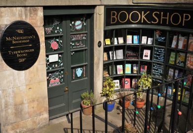 Edinburgh, Scotland - 8 April 2022 A small bookshop, claimed to be Edinburgh's smallest, at basement level near the top of Leith Walk. This shop is well-known for servicing and repairing old, manual, typewriters