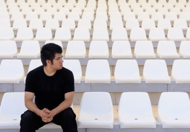 Man in empty stadium