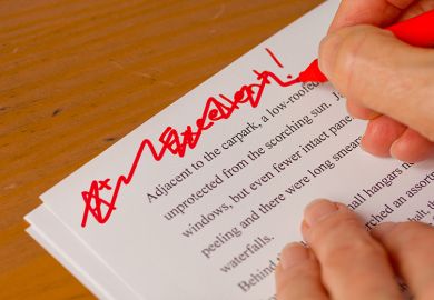 A grade for an essay being crossed out. To illustrate a call for universities to retain coursework but to stop grading it. A grade for an essay being crossed out. To illustrate a call for universities to retain coursework but to stop grading it.