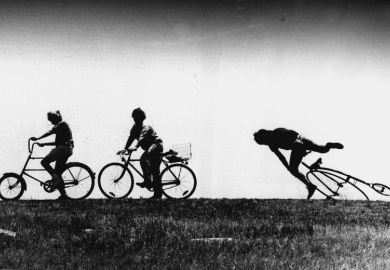 Person falling off bicycle behind others to illustrate students being behind after Covid Person falling off bicycle behind others to illustrate students being behind after Covid