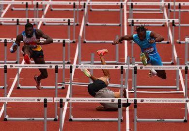 A competitor falls during a hurdles race. To illustrate that the country is “investing so much money in people who…we are not really capable of graduating”, according to Adam Tickell. A competitor falls during a hurdles race. To illustrate that the country is “investing so much money in people who…we are not really capable of graduating”, according to Adam Tickell.