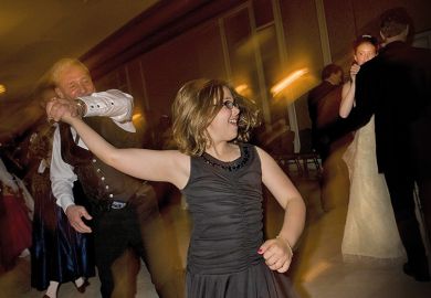 Father dancing with daughter