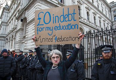 Protester dressed as Prime Minister Theresa May