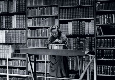 Female librarian at work