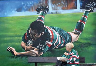 female-rugby-fand-and-mural