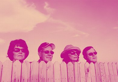 Men and women behind picket fence