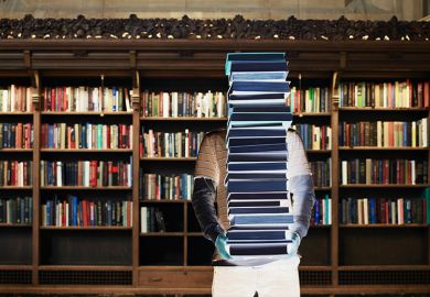 figure holding stack of books figure holding stack of books