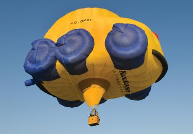 Flying hot-air balloon shaped as car, Rhineland-Palatinate, Germany