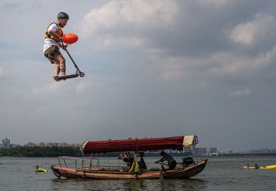 Man on scooter jumps into lake in China Man on scooter jumps into lake in China