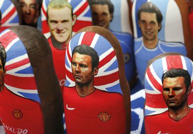Portraits of Manchester United footballers Wayne Rooney, Cristiano Ronaldo and Ryan Giggs on traditional Russian “matreshka” nesting dolls in Moscow Portraits of Manchester United footballers Wayne Rooney, Cristiano Ronaldo and Ryan Giggs on traditional Russian “matreshka” nesting dolls in Moscow