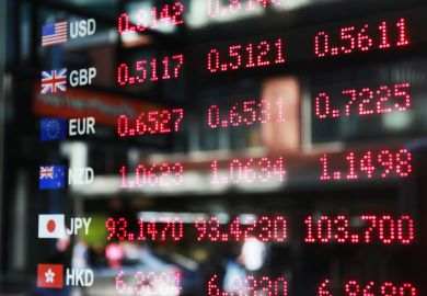 Electronic currency exchange notice board with several currencies listed