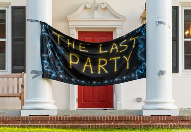 The Last Party banner hangs between the front columns of a fraternity house. To illustrate hazing at universities in the USA.