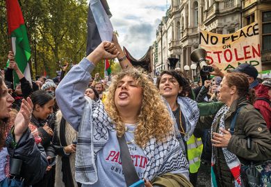 A woman chants at a pro-Palestine protest in London