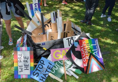 A pile of gay rights placards. To illustrate academia must ‘engage with’ anti-woke research critics.