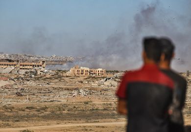  Smoke rises from destroyed buildings as Palestinians continue to flee northern Gaza following heavy Israeli attacks, in Gaza City, Gaza on 1 October, 2025.