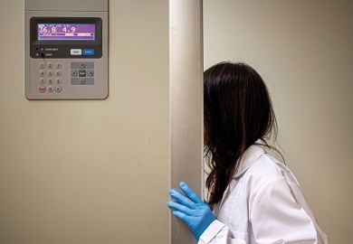 A female science student hides her face A female science student hides her face