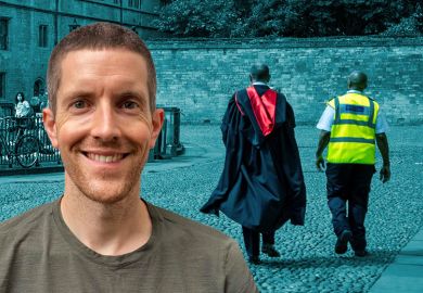 George Bass, with a university security guard and a person in academic robes walking in the background.