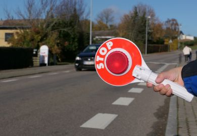 A stop sign at a pedestrian crossing in Denmark