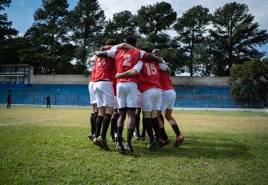  Soccer players celebrating a goal